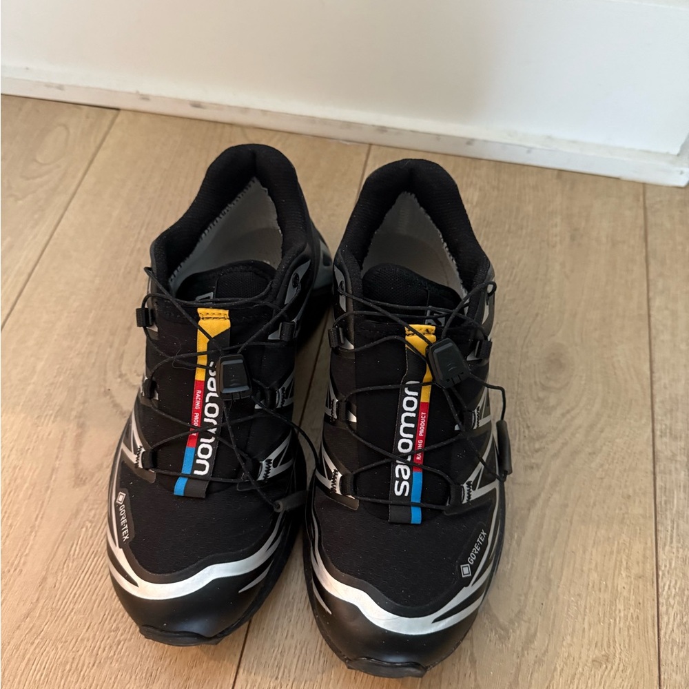 Salomon Black and White Athletic Shoes